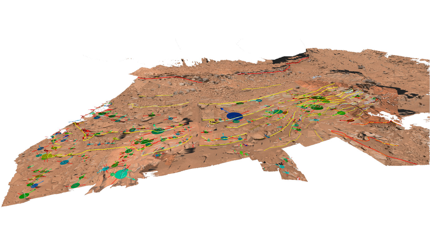 Zu sehen ist eine Rekonstruktion der Marsoberfläche: hellbrauner Boden sowie verschiedene Gesteinsschichten, die in bunten Farben mit Linien und Kreisen und Punkten geologisch annotiert sind.