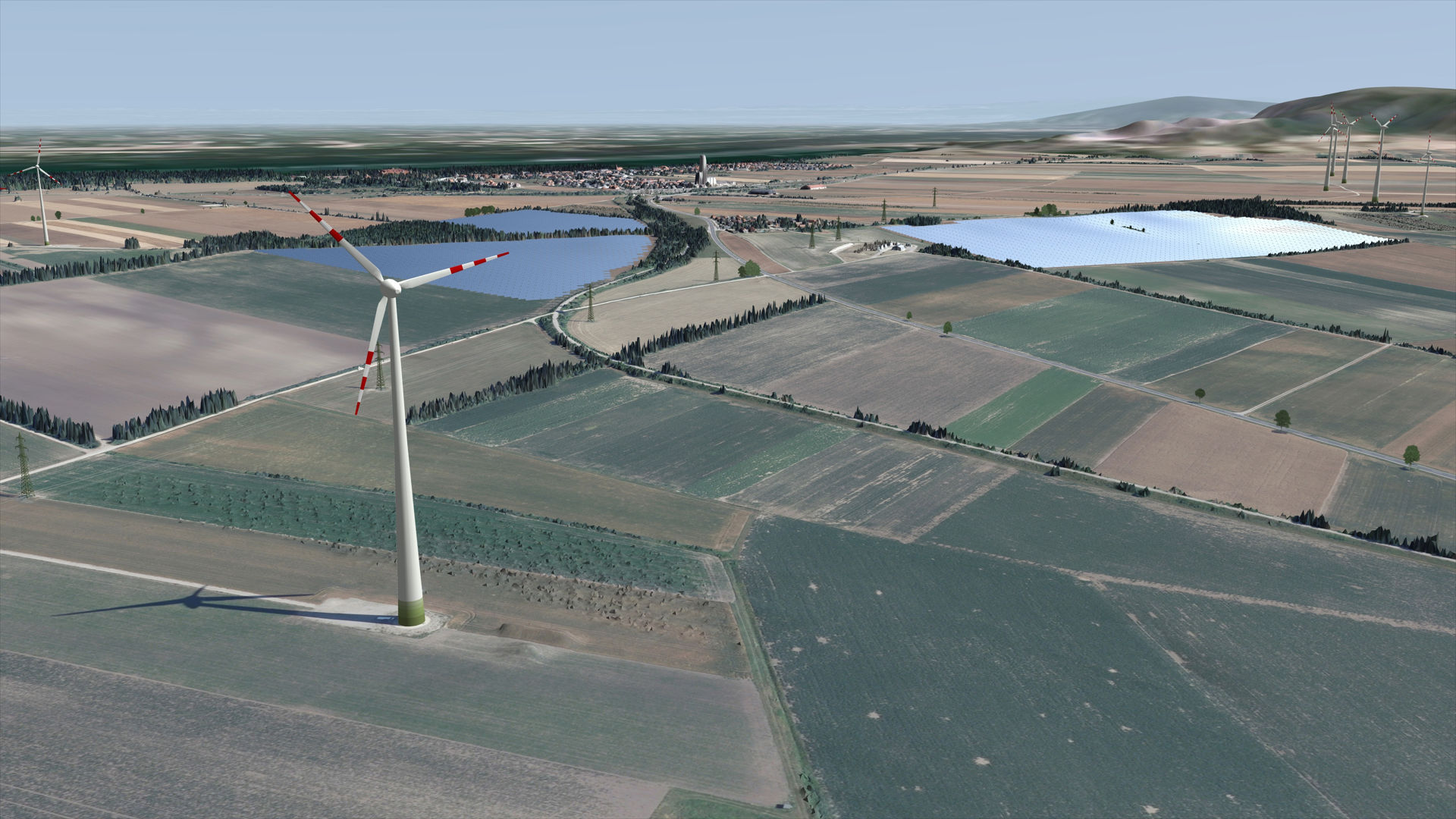 3D visualization of a wind farm with differently colored fields and a large wind turbine in the foreground