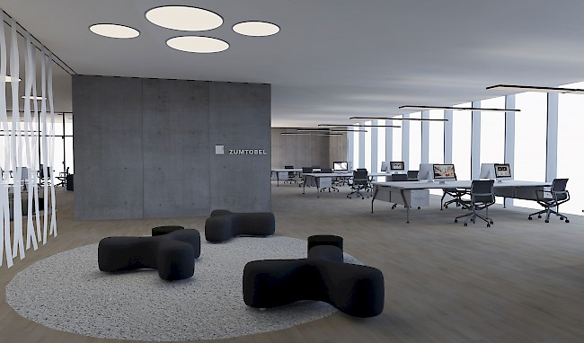 Büroraum, der mit einer Kombination aus Lichtdeisgn und natürlichem Licht ausgeleuchtet ist.