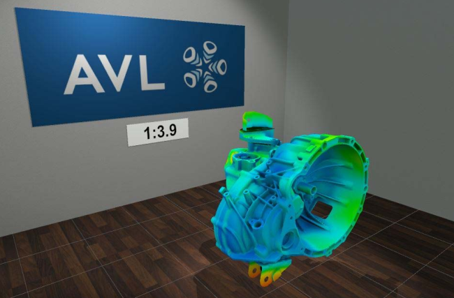 Screenshot einer VR-Umgebung mit dem Schriftzug AVL im Hintergrund und im Vordergrund ein grün-blau-rot-gelb eingefärbtes 3D-Motorenmodell