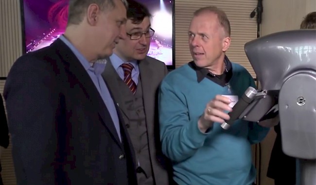Screenshot from the video of the exhibition by VRVis and AIT. In the picture: Three gentlemen, including Anton Fuhrmann and Werner Purgathofer.