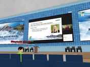 Screenshot aus der virtuellen Umgebung Virbela: Konferenzraum mit Avataren und Präsentationsscreens. 