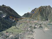 Visualization of a mountainous terrain, in the valley there is a city with buildings, on the visualization there are federal army markings.