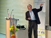 One of the high-profile keynotes at the VCT 2011 symposium: the speaker addresses the audience.